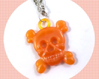 Vintage orange skull crossbones plastic gumball prize pendant necklace