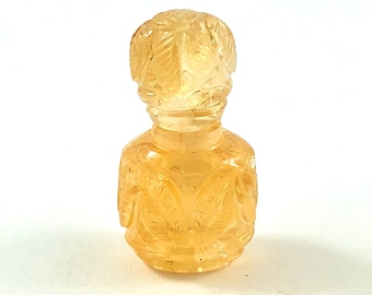 Citrine carved miniature perfume bottle with lid that opens 22.48 carats