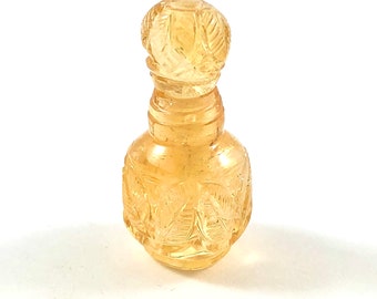 Citrine carved miniature perfume bottle with lid that opens 34.98 carats