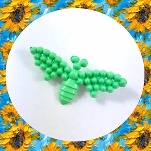 Vintage green cicada dot brooch