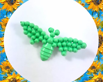Vintage green cicada dot brooch