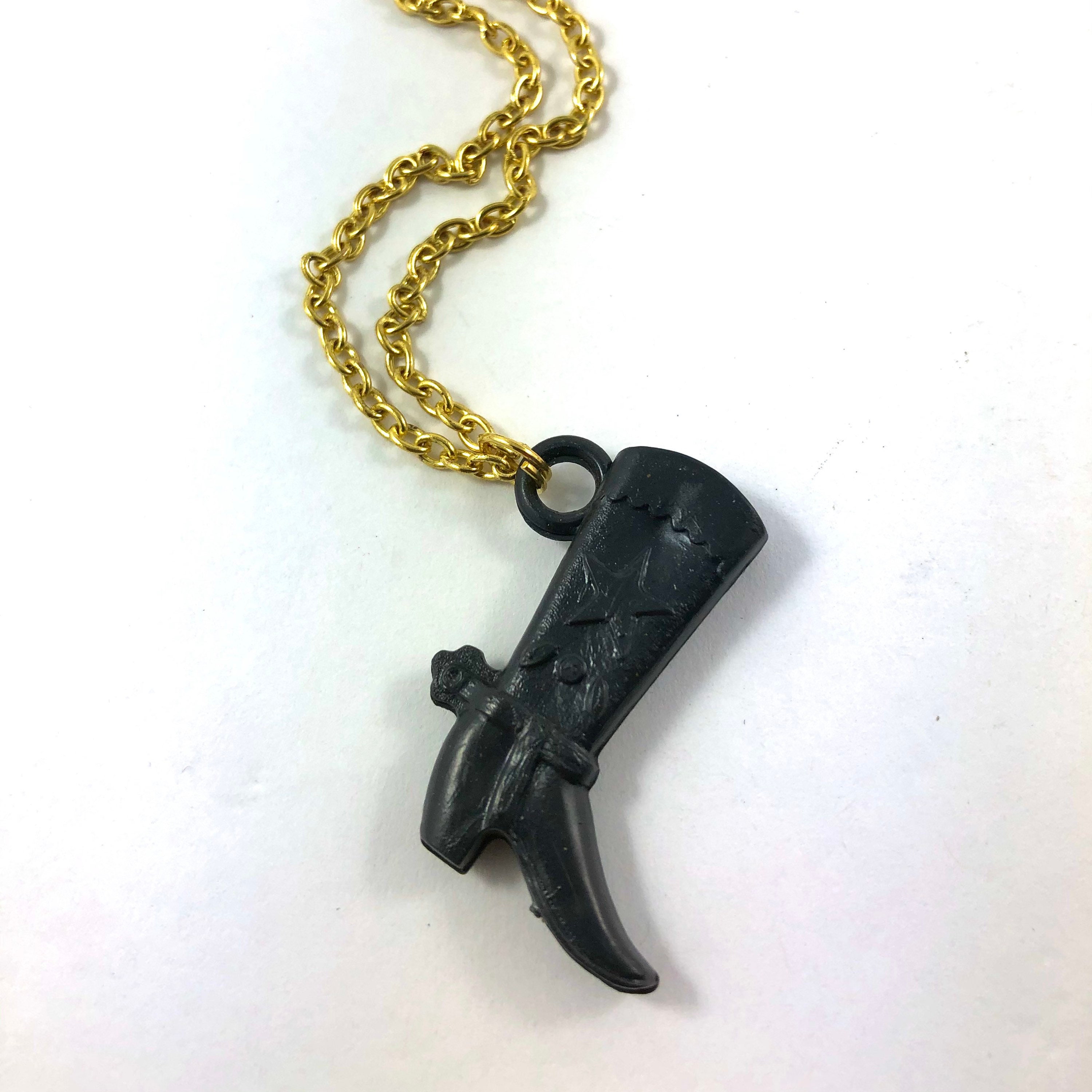 Vintage negro juguete pistola revólver plástico gumball premio encanto  colgante collar -  México