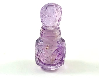 Amethyst carved miniature perfume bottle with lid that opens 26.23 carats