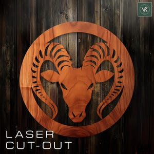 May include: A wooden cutout of a ram's head with intricate details in the horns. The cutout is circular and has a brown wood grain finish. The background is a dark wood panel with the text "LASER CUT-OUT".