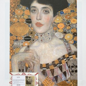 May include: A painting of a woman with dark hair and a gold and black patterned dress. The woman is wearing a pearl necklace and has a gold bracelet on her wrist. The background is a gold and black abstract pattern.