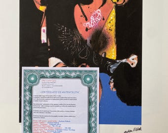 May include: A certificate of authenticity for a graphic print by Jackson Pollock. The certificate is in Italian and includes details about the print, such as the title, dimensions, and edition number. The print is a colorful abstract work with a black background.