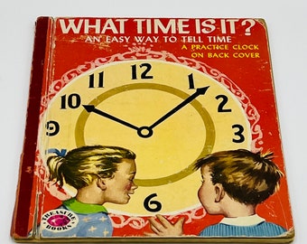 Vintage What time Is It? Tell Time, Practice Clock on Back, Copyright 1954