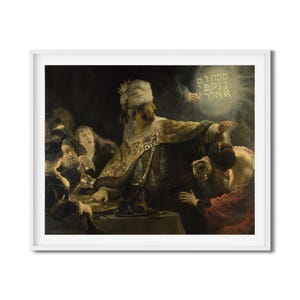 May include: A framed print of a historical painting depicting a scene with several figures. The central figure, wearing a turban and ornate clothing, gestures towards a glowing inscription. Other figures are gathered around a table.