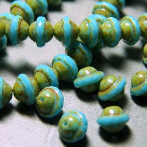 Czech 8x10mm Turquoise with Picasso Faceted Fire Polished Glass Saturn Beads (12)