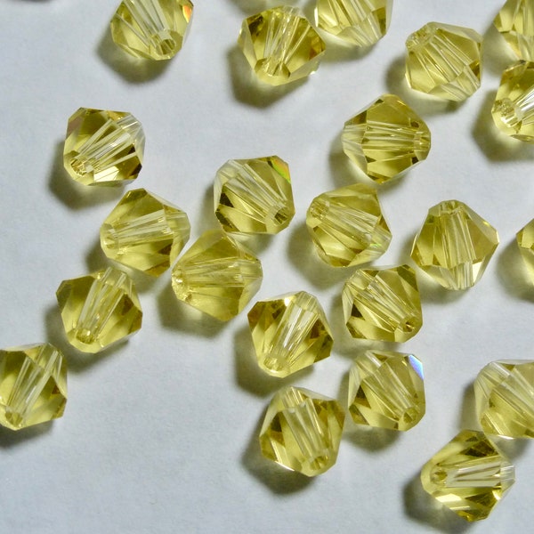 Swarovski Jonquil 6mm Faceted Crystal Bicone Beads  (10)