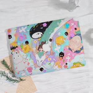 May include: A rectangular, colorful case featuring a whimsical illustration with characters and elements from an animated film. The design includes a variety of creatures, flowers, and a flowing, rainbow-colored background. The case has a light blue, pink, and yellow color scheme.