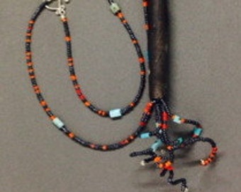 Wapiti Raku and beaded pendant