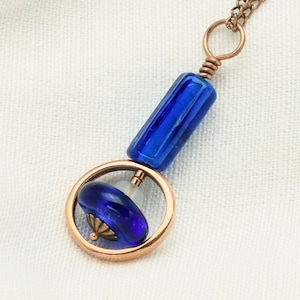 Cobalt Blue Lampwork Pendant in a Copper Circle lamp74