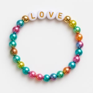 Pulsera de cuentas de arcoíris personalizada / Pulsera con nombre para niña o mujer / Joyería elástica con inicial personalizada / Regalo colorido para ella o adolescente