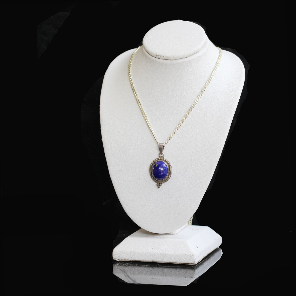 silver chain with blue stone