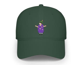 May include: A dark green baseball cap featuring a centered graphic of a cartoon character wearing a purple grape costume. The character has a green hat, a yellow shirt, blue shorts, and black shoes, with arms outstretched in a pose.