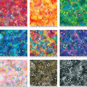 May include: Nine colorful fabric swatches with a repeating pattern of geometric shapes, including hexagons, stars, and circles. The fabric is a mix of blue, green, red, orange, yellow, pink, and black.
