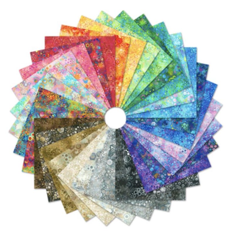 May include: A collection of 24 fabric squares featuring a colorful, abstract pattern of circles and dots. The squares are arranged in a fan shape, with the colors transitioning from yellow to red to blue.
