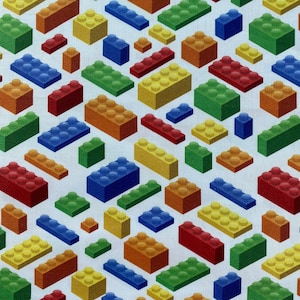 May include: A seamless pattern of colorful plastic building blocks in various shapes and sizes. The blocks are arranged in a diagonal pattern on a white background.