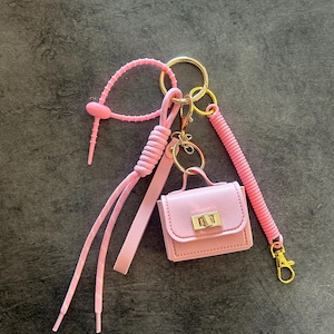 Charm de sac à main, bijoux de sac en corde, pendentif en forme de sac, noeud et mousqueton, grigri de sac, accessoire de porte-clés en cuir