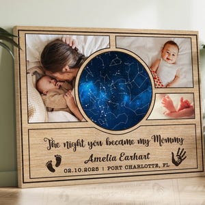 May include: A wooden canvas print with a blue starry night sky design. The print features three photos: a mother holding a baby, a baby sitting on a blanket, and a baby's feet. The text reads "The night you became my Mommy Amelia Earhart 02.10.2025 | PORT CHARLOTTE, FL".