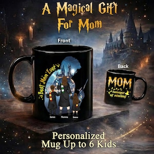 May include: Black ceramic mug with a wraparound design featuring a mother and two children in front of a castle, with the text "Best Mom Ever." The back of the mug says "MOM manager of mischief."