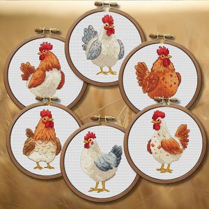 May include: Six embroidered chicken designs in wooden hoops. Each chicken has a unique color scheme, including red, orange, white, and blue. The chickens are depicted in a cross-stitch style, with detailed feathers and combs.