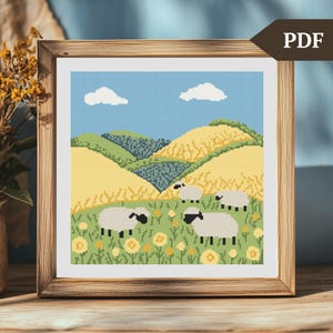 Peut inclure: Modèle de point de croix représentant une scène de campagne avec des collines vallonnées, un ciel bleu avec des nuages blancs et un groupe de moutons blancs dans un champ vert avec des fleurs jaunes.