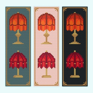 Fancy Lamps cross stitch bookmark pattern features two unique antique inspired lamps in appealing shades of orange and red with patinaed brass accents. Examples shown on three different fabric colors: Light Pink, Dark Teal, and Black.