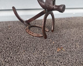 Metal dog sculpture