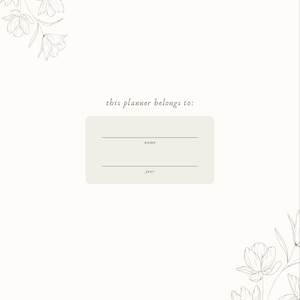 May include: Cream-colored planner with floral line art accents. The text "this planner belongs to:" is above a rectangular box with lines for "name" and "year". Delicate flower illustrations are in the corners.