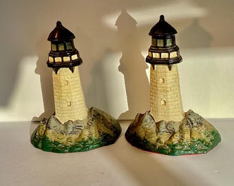 Sujetalibros antiguos con forma de faro