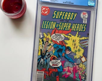 Superboy And The Legion Of Super-Heroes #232 CGC 9.4 (1977) • Slaps Saturn Girl - Comic book