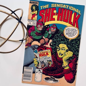 マーベル　本 Amazon.com: The Official Handbook of the Marvel Universe #14