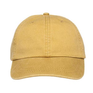 May include: Mustard-colored baseball cap with a curved brim. The cap is made of a durable fabric and features a top button and stitched details. A classic, casual accessory.