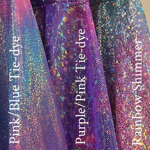 May include: Three swatches of iridescent fabric in pink/blue tie-dye, purple/pink tie-dye, and rainbow shimmer.