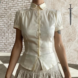 Pale Butter Yellow Gothic Pinstripe Fitted Blouse with a button down high neck and puffy sleeves