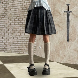 Black and Grey Pleated Plaid Midi Skirt featuring a belt