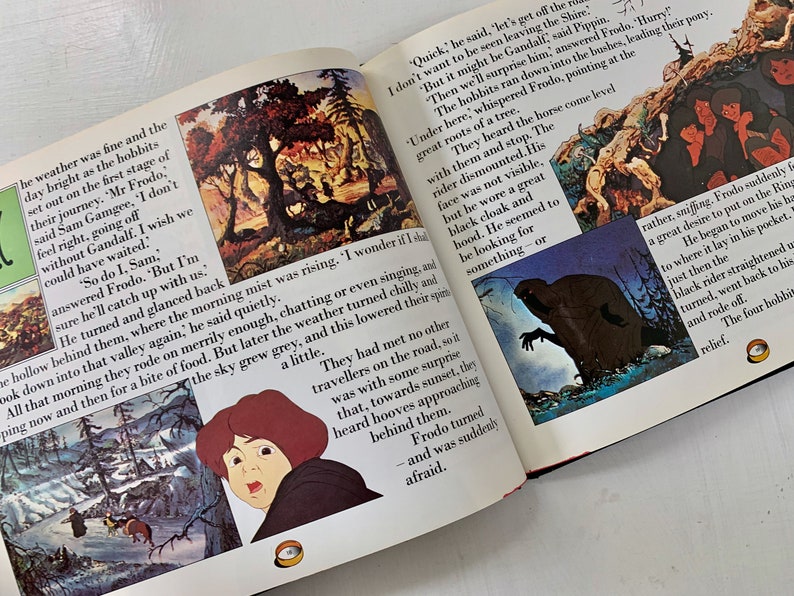 May include: A book open to a page with illustrations and text from the Lord of the Rings. The text reads, "Quick," he said, "let's get off the road. I don't want to be seen leaving the Shire." The illustrations show a dark figure in a hooded cloak and a group of hobbits running through a forest.