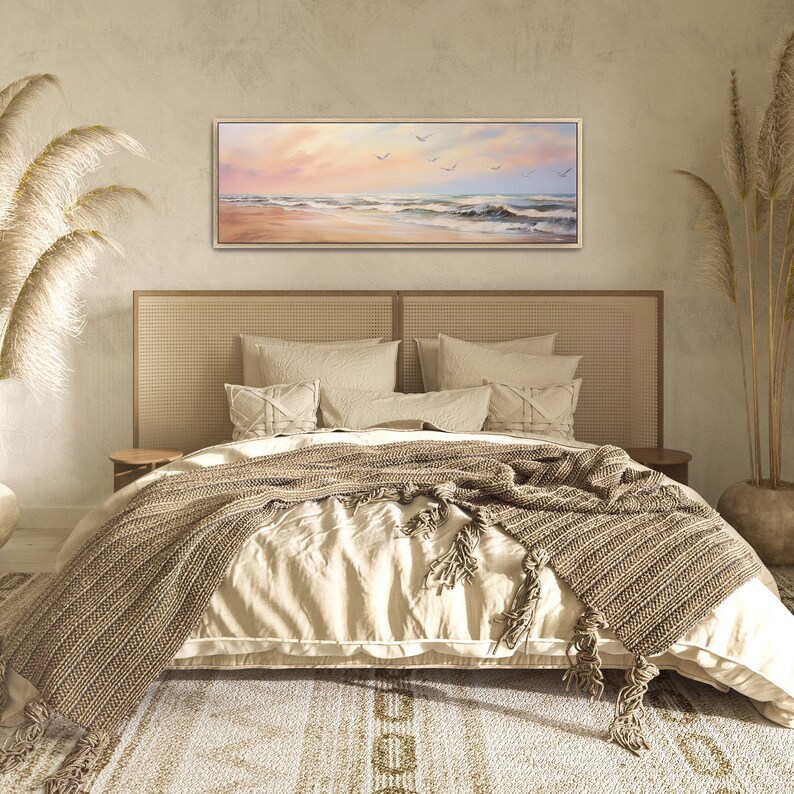 a bedroom with a large bed and a painting on the wall