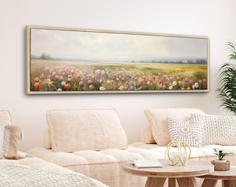 May include: A long, horizontal canvas painting depicting a field of pink and white wildflowers in a soft, pastel color palette. The field is set against a hazy, blue sky with a distant horizon.