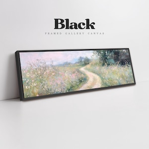 a painting hanging on a wall next to a white wall