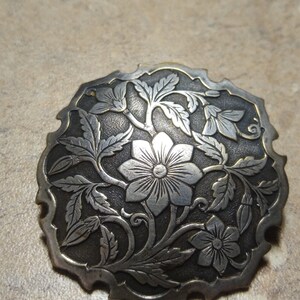 Silver flower pin brooch