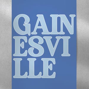 May include: A blue poster with the text "GAIN ESVILLE" in white letters.
