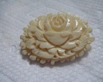 Carved Bovine Flower or Rose Pin in Oval Shape Marked TAIWAN