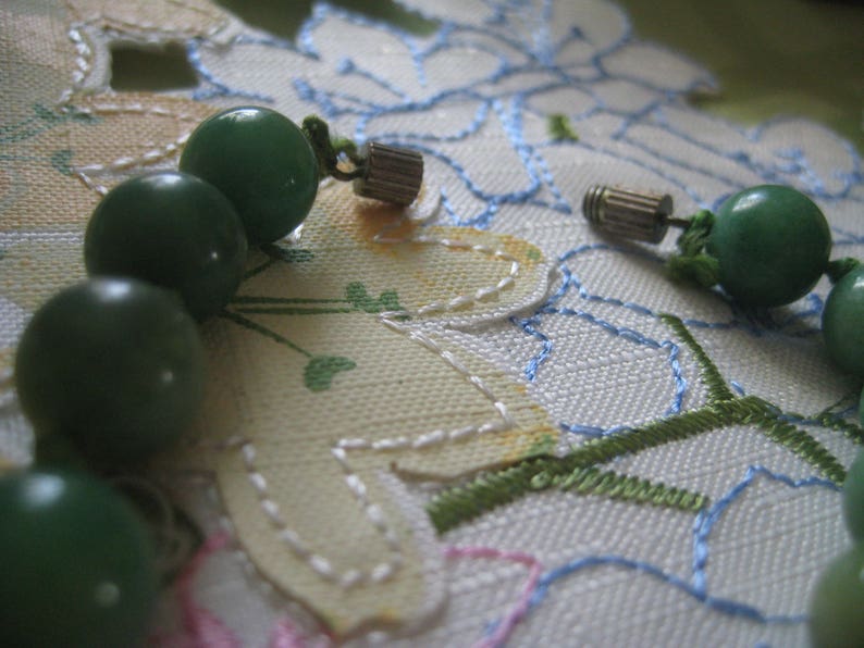 Natural Color Jade Beads Hand Tied with Silk and Barrel Clasp 24 Inches Long 46 11mm Beads