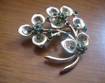 70s Gold Flower Brooch with Emerald Rhinestones Like New Condition