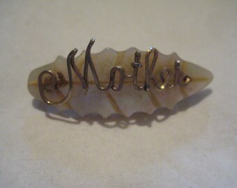 Mother on Mother of Pearl Sweetheart Brooch from the 40s  So Lovely