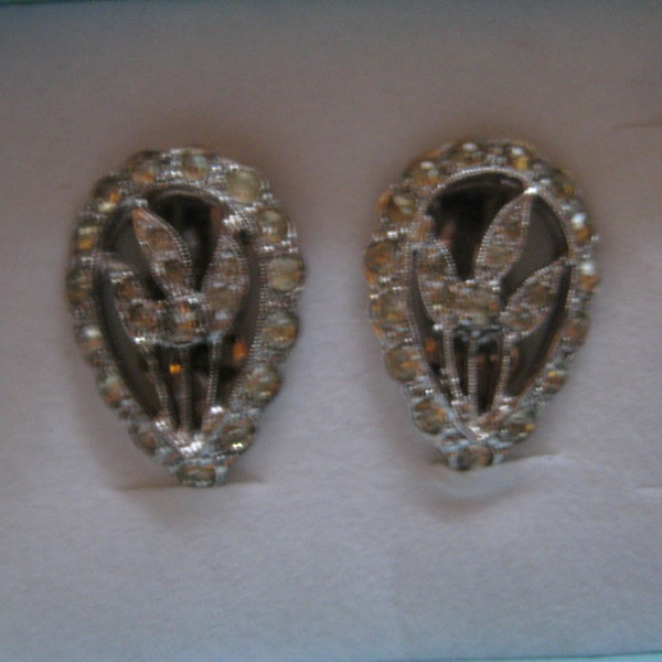 POLCINI Floral Center Rhodium Plated Clip On Earrings with Rhinestone Accents