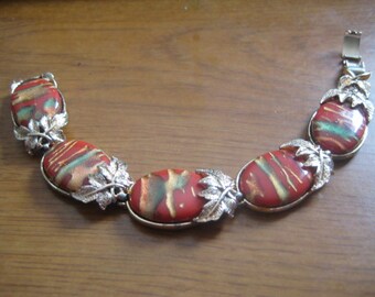 CORO  Goldtone Link Bracelet Floral Design with Orange Cabochons Mid Century Beauty